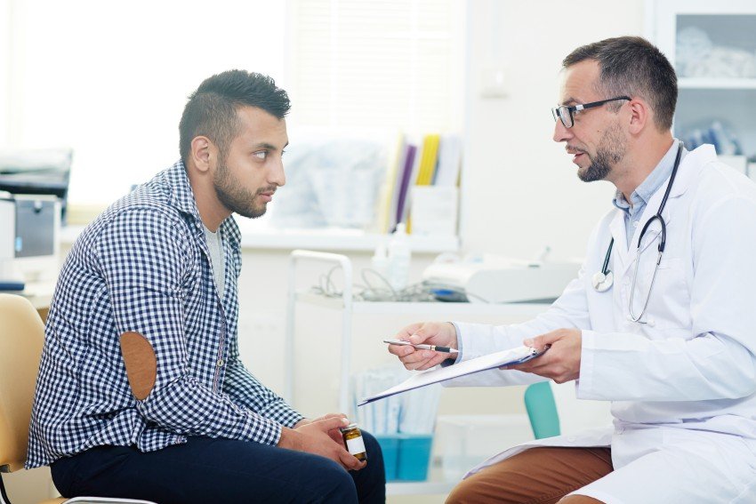 Doctor consulting a male patient during an Advance Urology consultation in Paschim Vihar